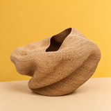 Handwoven sculptural basket