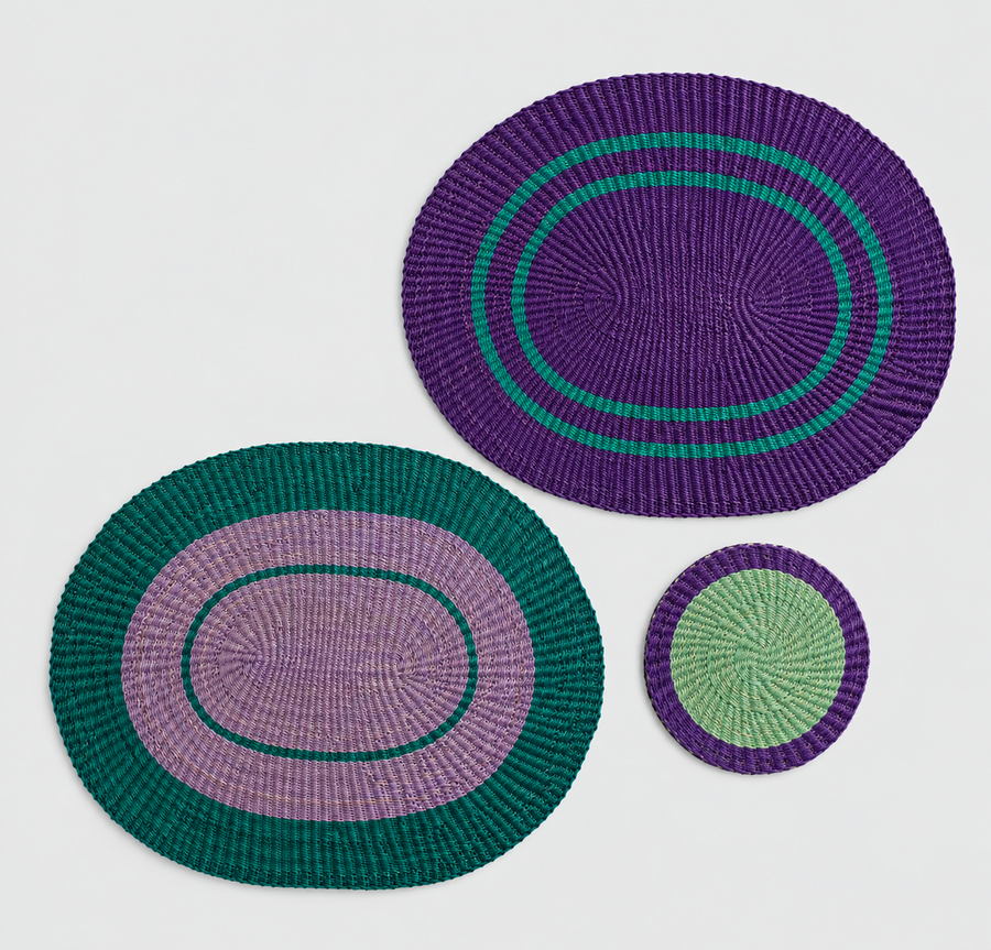 Purple and green woven placemats with a matching coaster