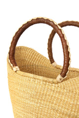 Natural tote basket with leather strap